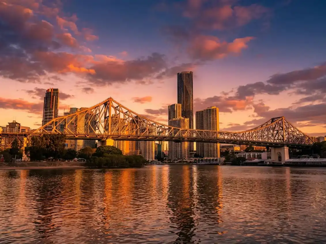 The Brisbane Story Bridge at sunset, representing the urban inspiration behind the Story Seeker premium hoodie collection.